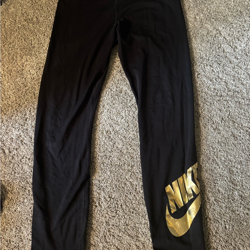 Nike Leggings in Black with Gold Swoosh
